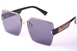 Gucci 06 Metal Frame Sunglasses with Partial Engraving and Gradient Lenses.