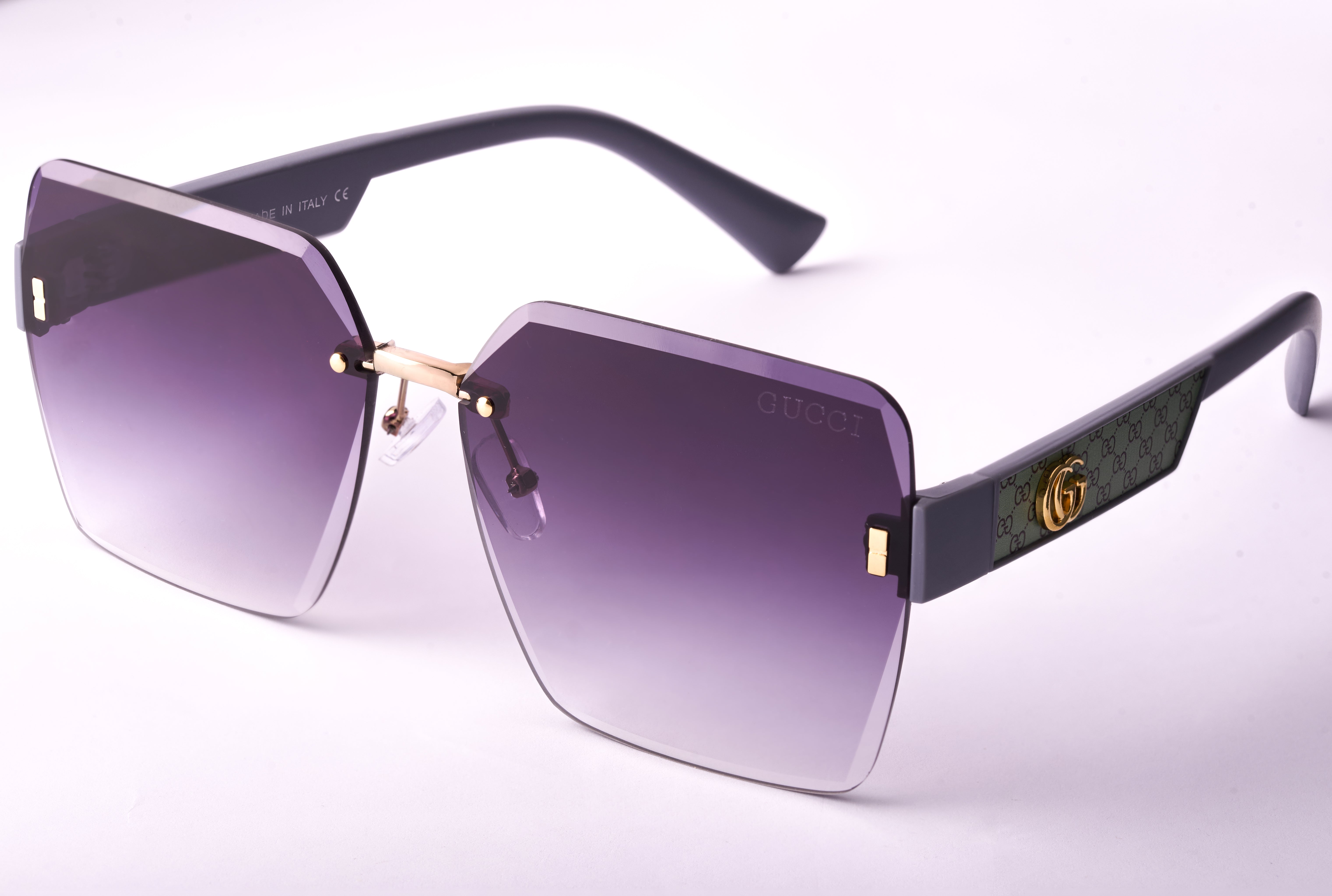Gucci 06  Metal Frame Sunglasses with Partial Engraving and Gradient Lenses.