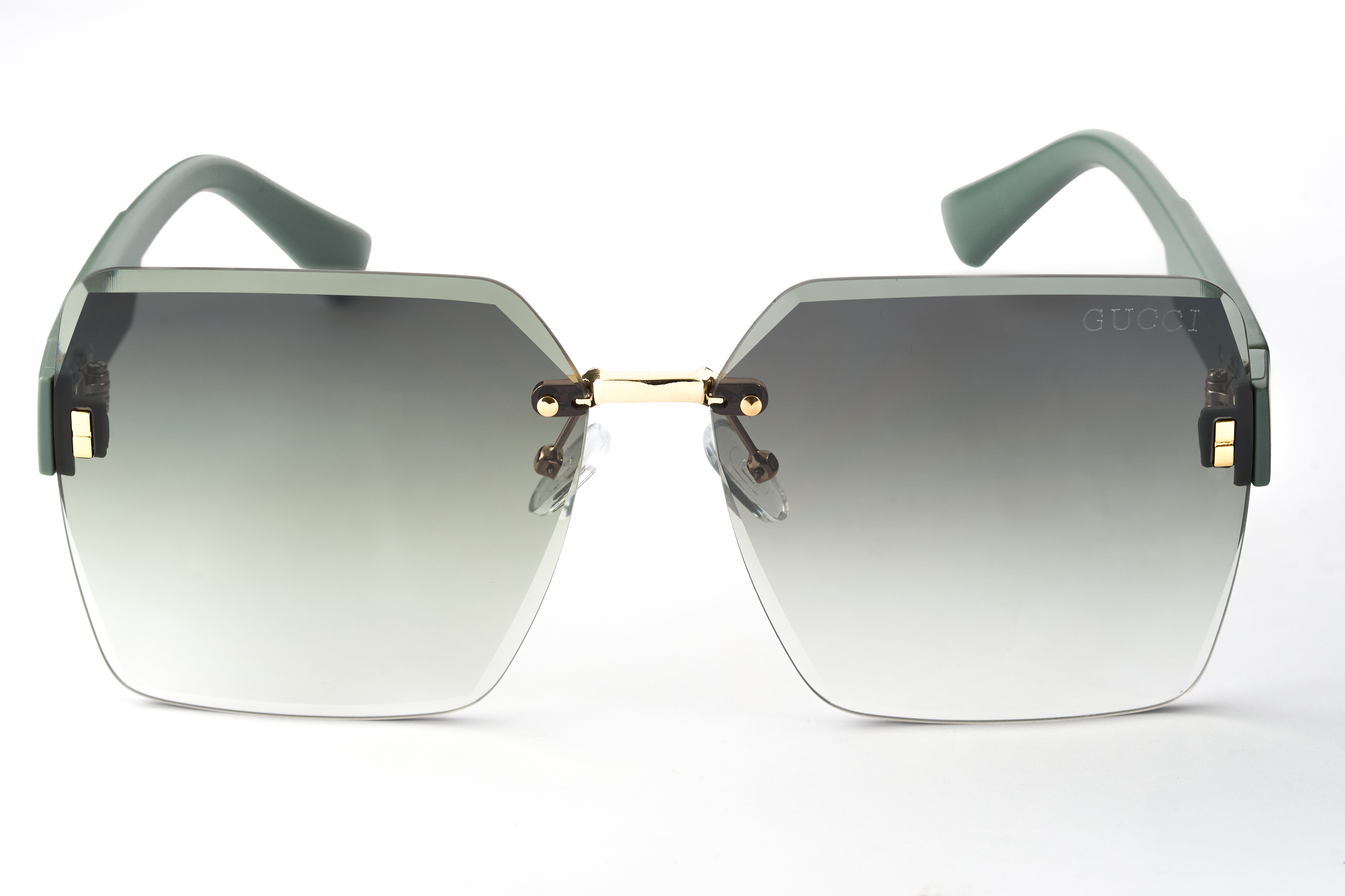 Gucci 06  Metal Frame Sunglasses with Partial Engraving and Gradient Lenses.