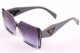Prada women’s sunglasses feature a refined frame 05